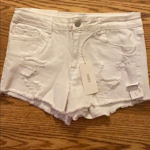 Ripped white shorts